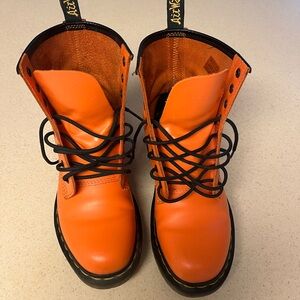 Dr. Martens Bright Orange Boots with Black Accents